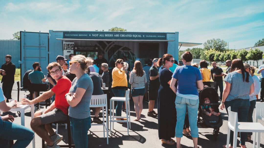People enjoying the Four Fathers Brewing Company BoxPop®