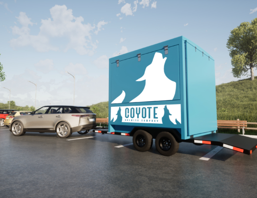 a trailerbox being pulled by a car